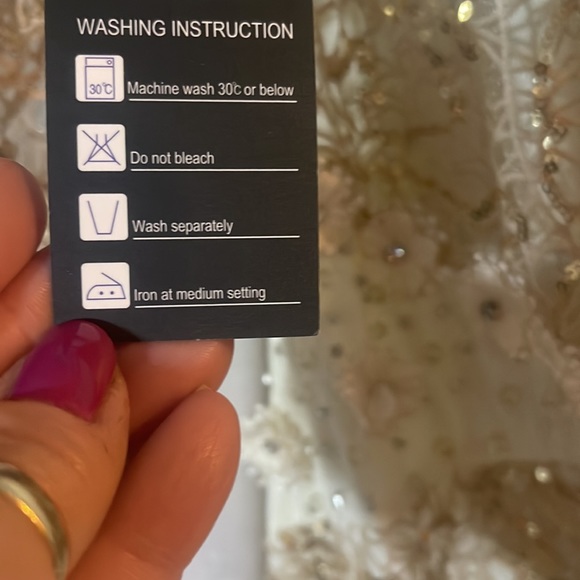 New with tags cream evening gown with champagne gold sequined overlay lace. - Picture 10 of 13